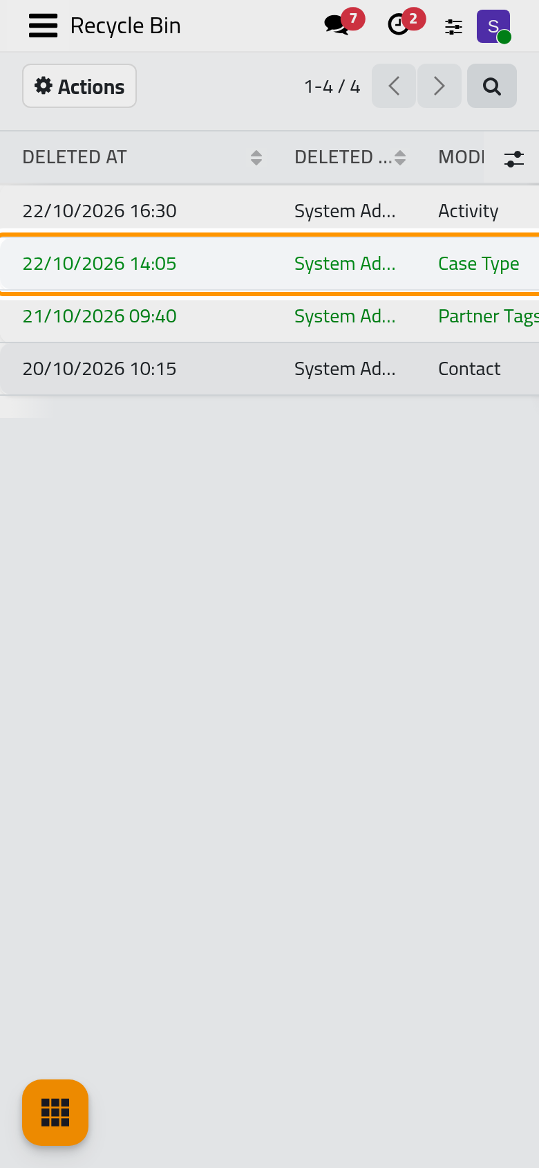 In the list, a restored entry shows in green with the status Restored.
