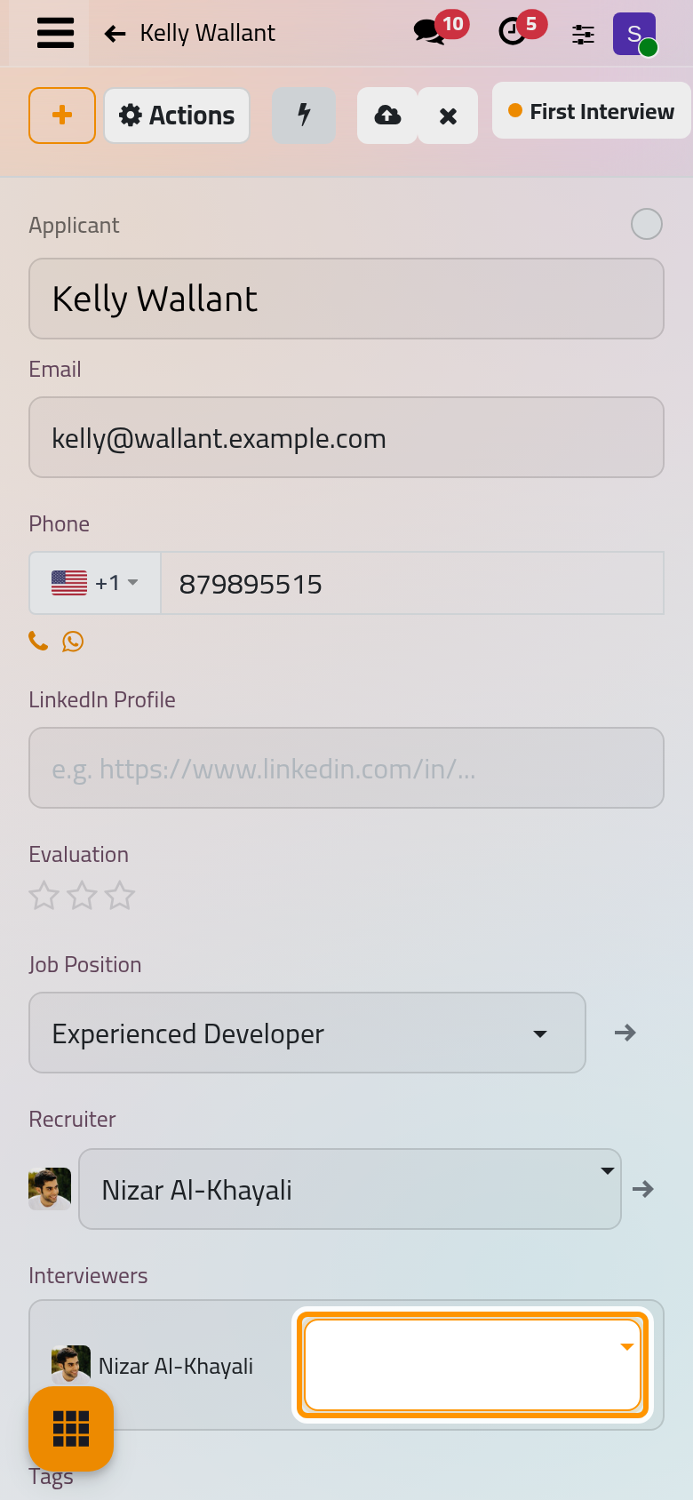 An interviewer added to the applicant; the Meeting button sits above the form.
