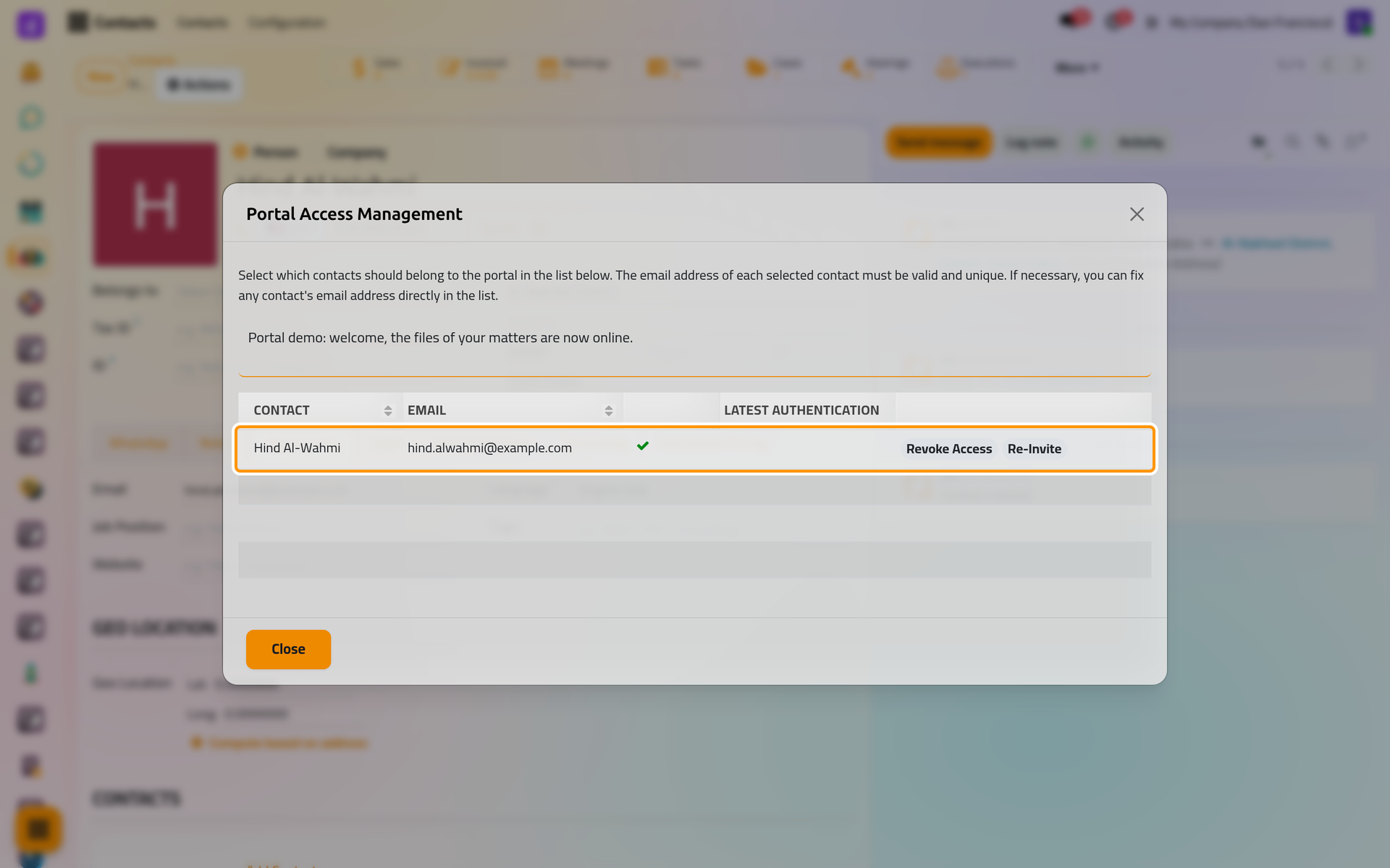 The account exists and the invitation has left; the row now offers Revoke Access and Re-Invite.